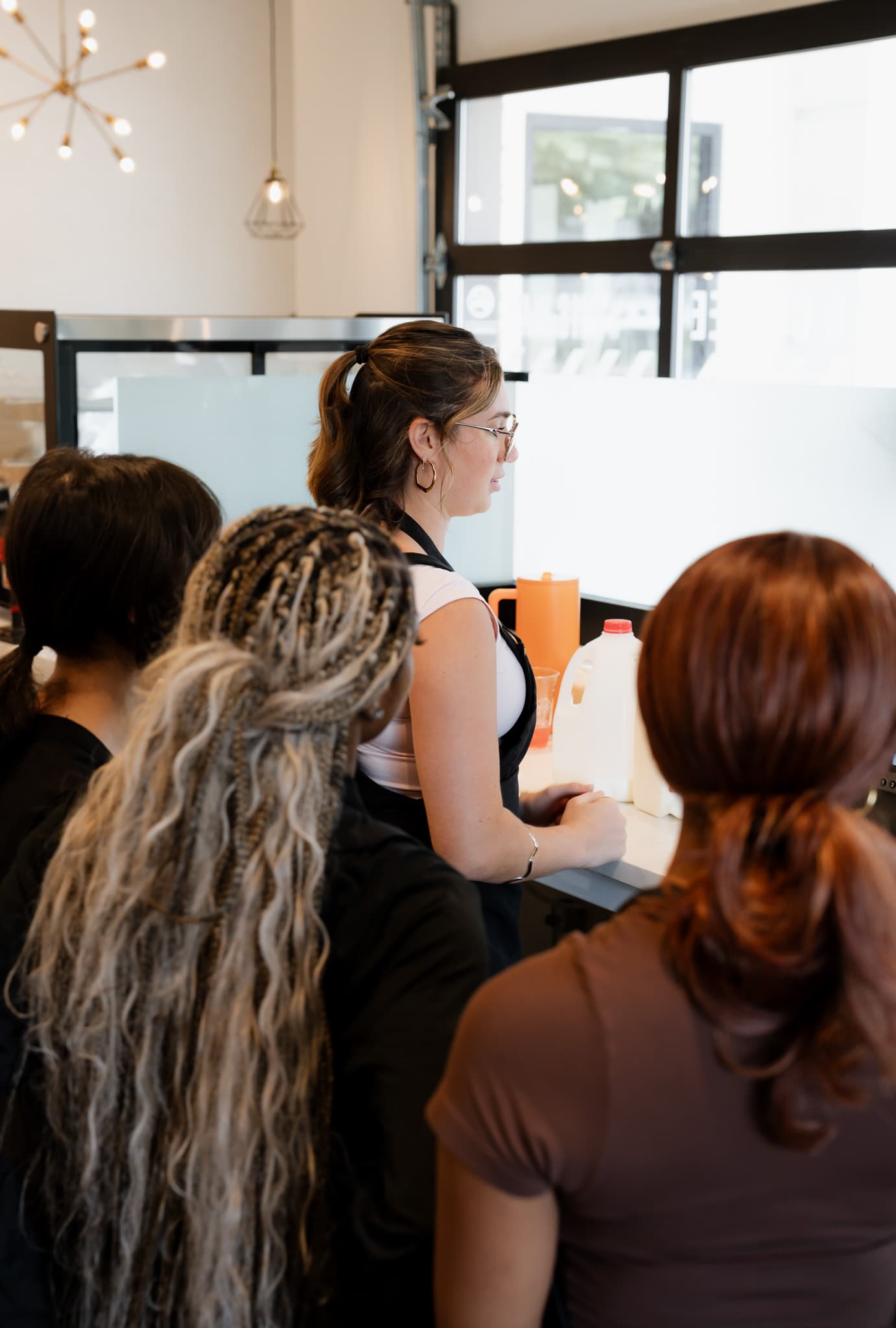 The Royal Coffee crew serving guests at the counter